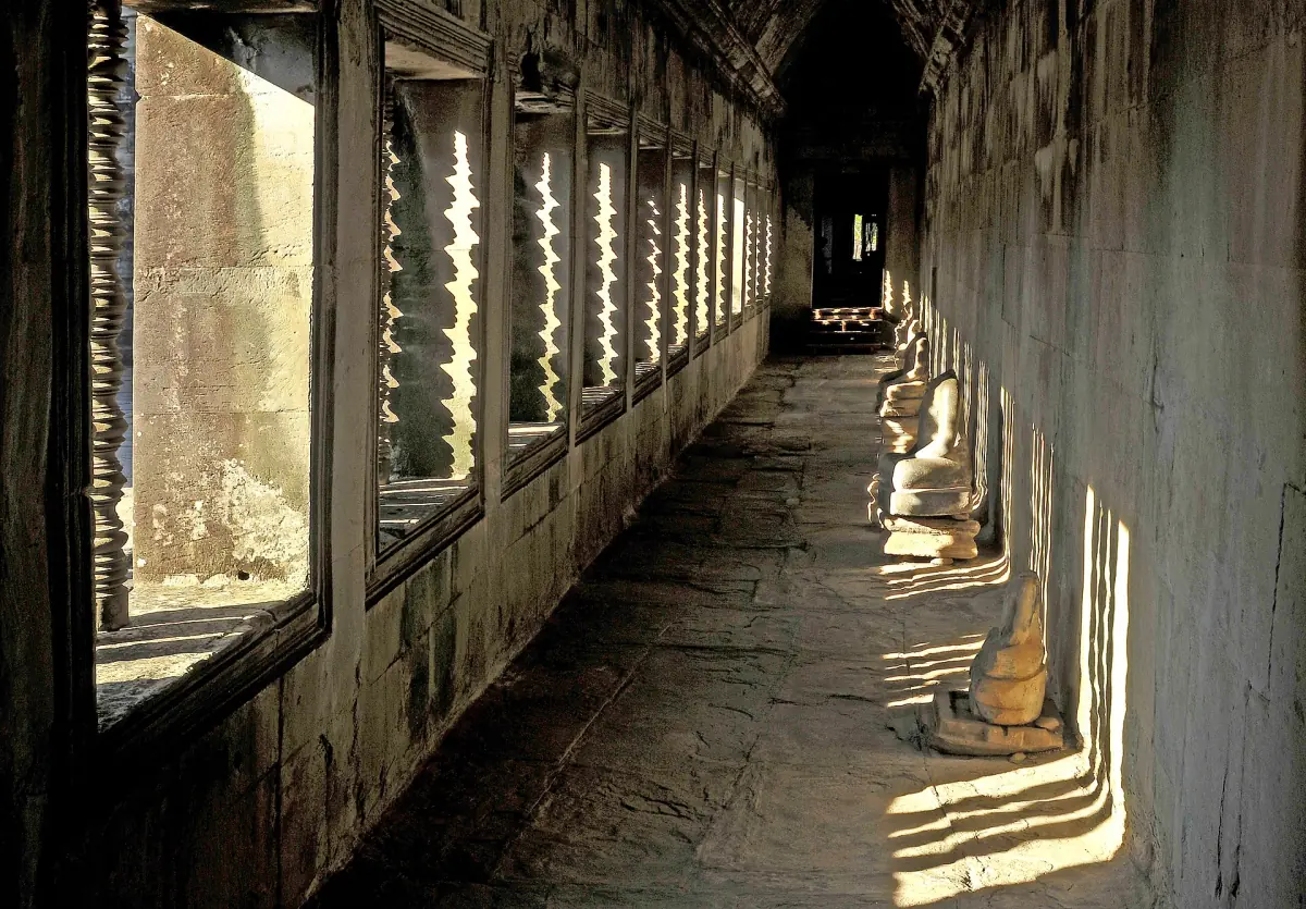 A shaded gallery inside Angkor Wat